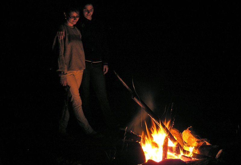 People by a fire