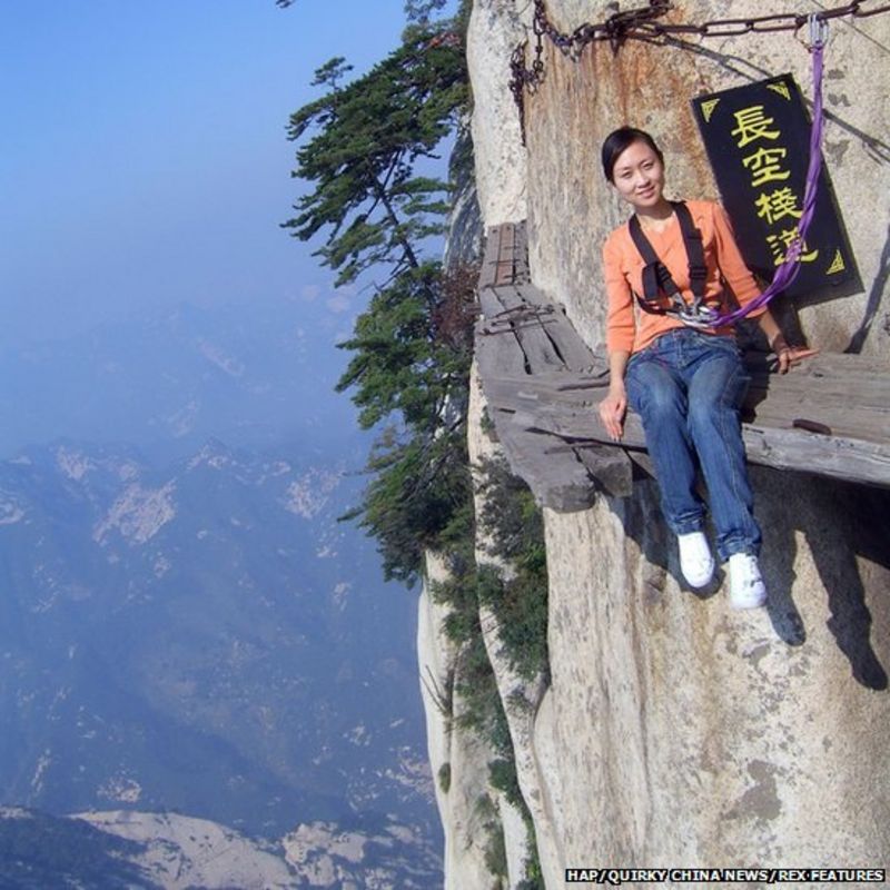 World's scariest walkway? Tourists brave Chang Kong Cliff Road in China ...