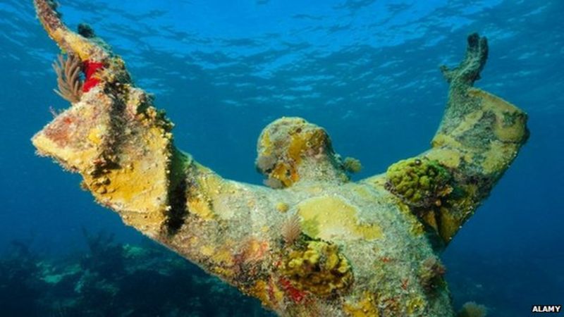 underwater statue of jesus