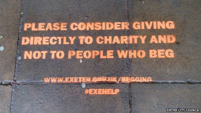 Anti-begging messages sprayed on Exeter pavements - BBC News