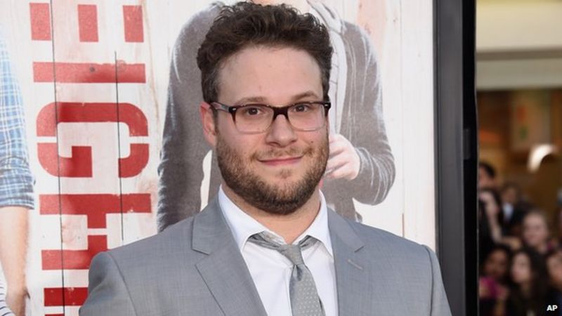 Seth Rogen in row with critic over shooting comments - BBC News