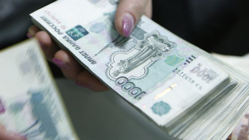 Rouble rebounds as central bank says it could take action - BBC News