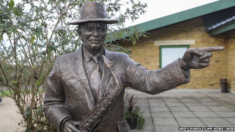 Sir John Dankworth statue unveiled at The Stables - BBC News