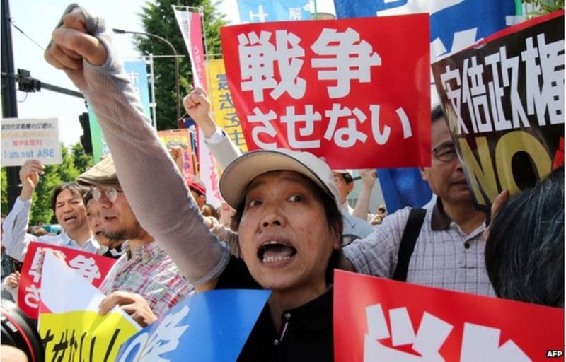 Japan self-defence laws reform backed by cabinet - BBC News