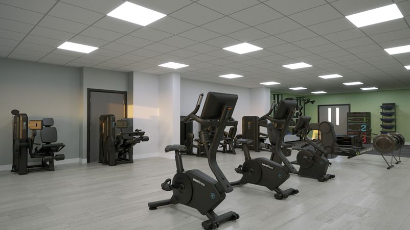 A computer-generated indoor gym with a set of cycling machines