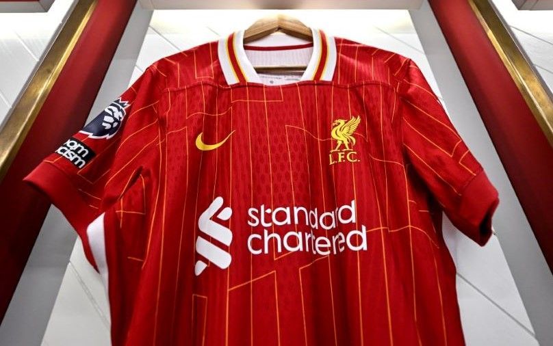 Liverpool FC shirt with Standard Chartered branding
