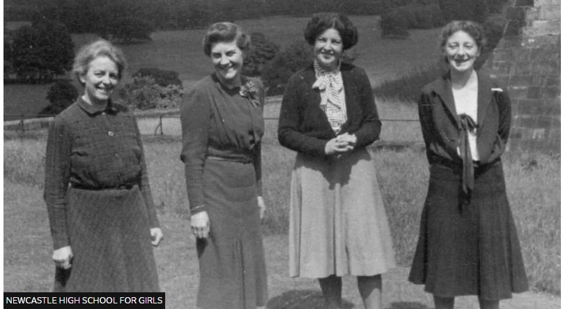 An image of four teachers from during the 2nd World War standing outside Alnwick Castle 