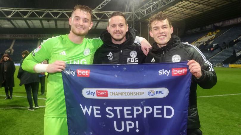 Leicester goalkeepers Jakub Stolarczyk, Danny Ward and Mads Hermansen celebrate winning the Championship