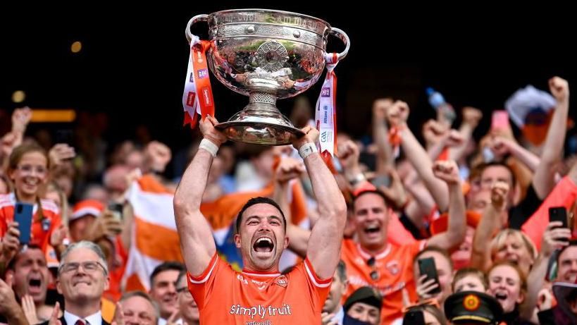 Aidan Forker lifts the Sam Maguire Cup 