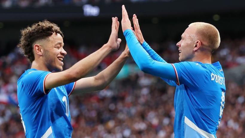 Jon Dagur Thorsteinsson (right) celebrates after giving Iceland the lead at Wembley