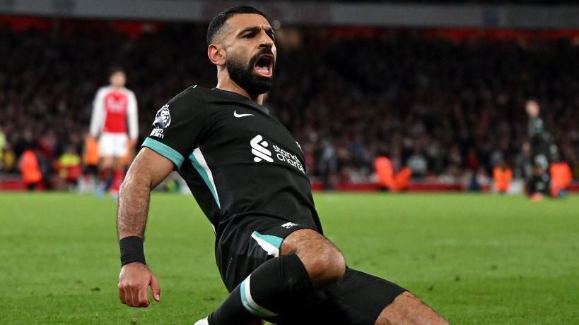 Mohamed Salah celebrates his late equaliser for Liverpool at Arsenal