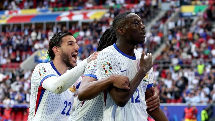 France players celebrate their winner against Belgium