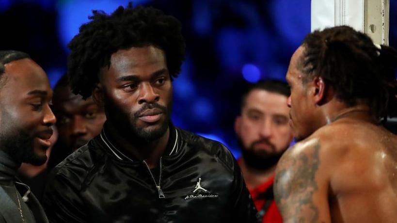 Joshua Buatsi speaks to Anthony Yarde at ringside