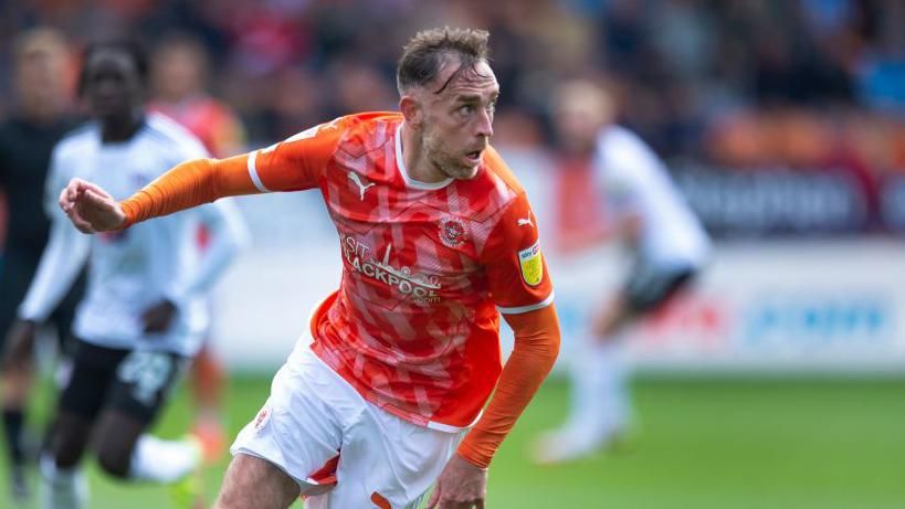 Richard Keogh in action for Blackpool