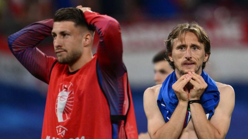 Luka Modric looks stunned as Italy equalise against Croatia