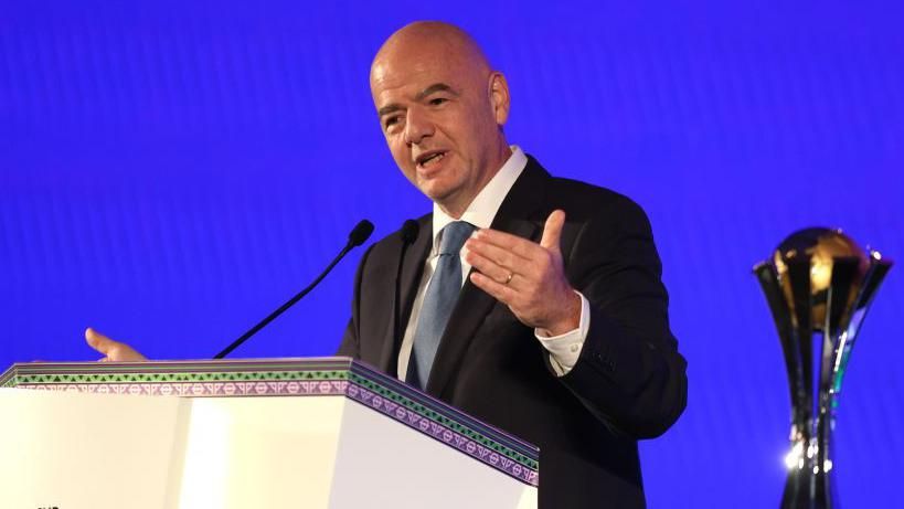 FIFA president Gianni Infantino stands at a lectern