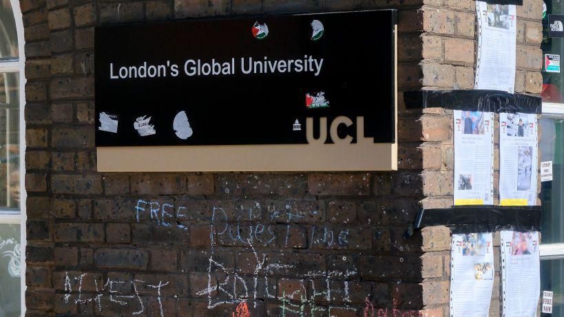 A UCL sign with with Free Palestine graffiti 