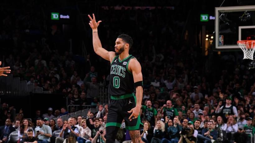 Boston Celtics' Jayson Tatum celebrates after beating the Miami Heat in the 2024 NBA Play-Offs
