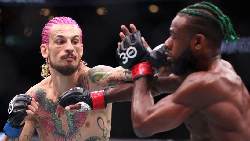 Sean O'Malley throws a punch at Aljamain Sterling during the pair's bantamweight title fight at UFC 292 in August 2023.