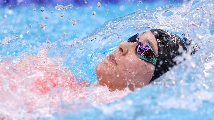 Para-swimmer Alice Tai in action