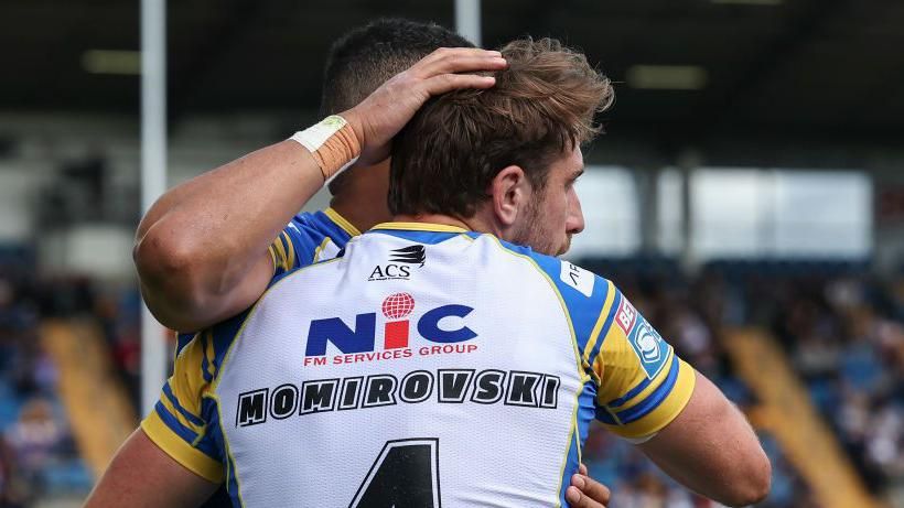 Leeds Rhinos' Paul Momirovski celebrates scoring his side's second try against London Broncos