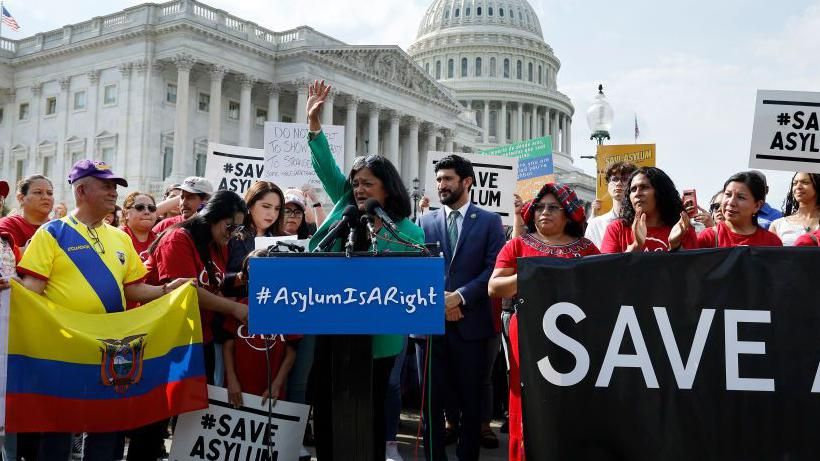  Pramila Jayapal and Democratic lawmakers at an event protesting Joe Biden's executive action in early June