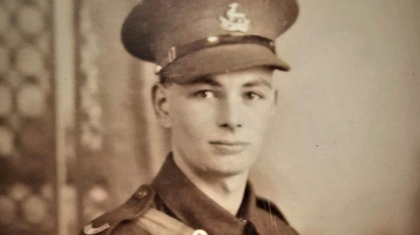 Black-and-white photo of Private George Brueton in uniform