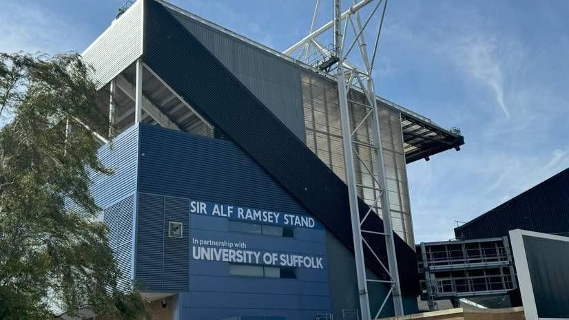 The University of Suffolk branding that has been placed on Ipswich Town's Sir Alf Ramsey stand at Portman Road