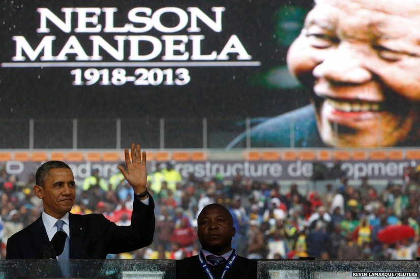 US President Barack Obama addresses the crowd during a memorial service for Nelson Mandela