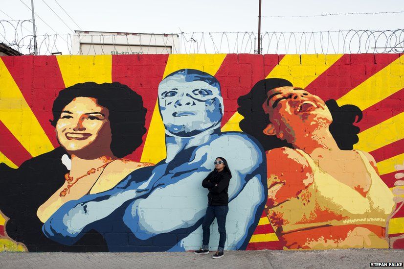 Ana Maria Cruz alias Ana Formismo in front of her mural in Ciudad Juarez, Chihuahua, Mexico