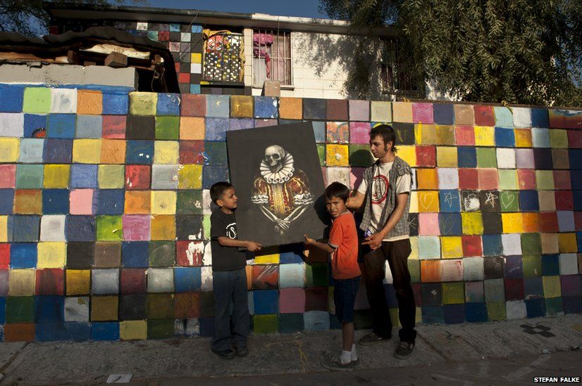 Efren De La Cruz, painter, in front of his apartment building in Mexicali, Baja California, Mexico