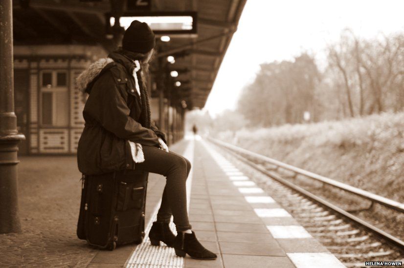 Woman on railway platform