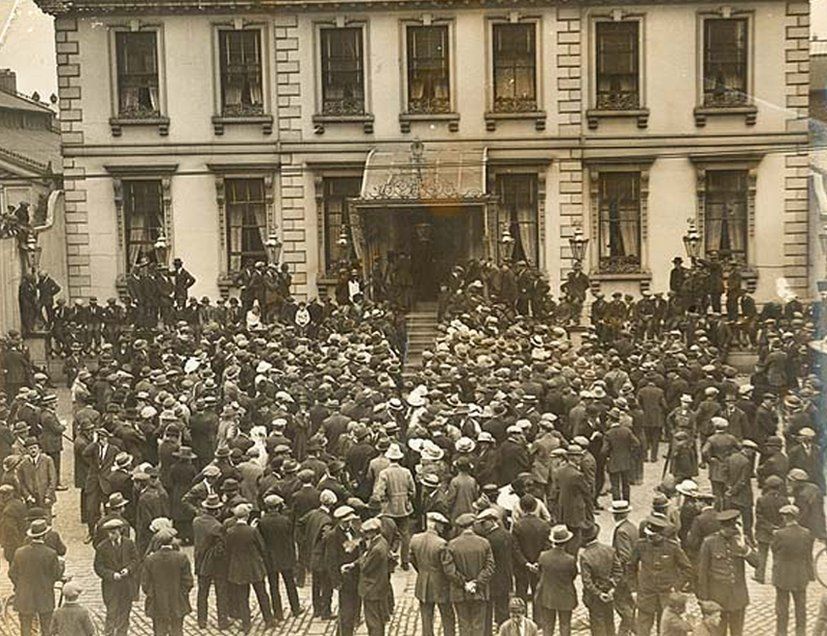 A crowd outside Dublin's Mansion House on 8 July 1921, waiting for confirmation of the truce