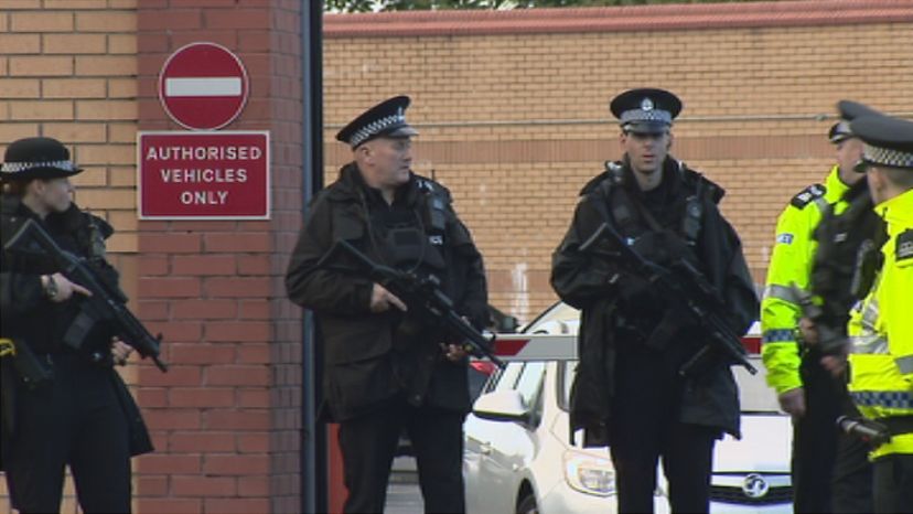 Govan police station with armed police outside