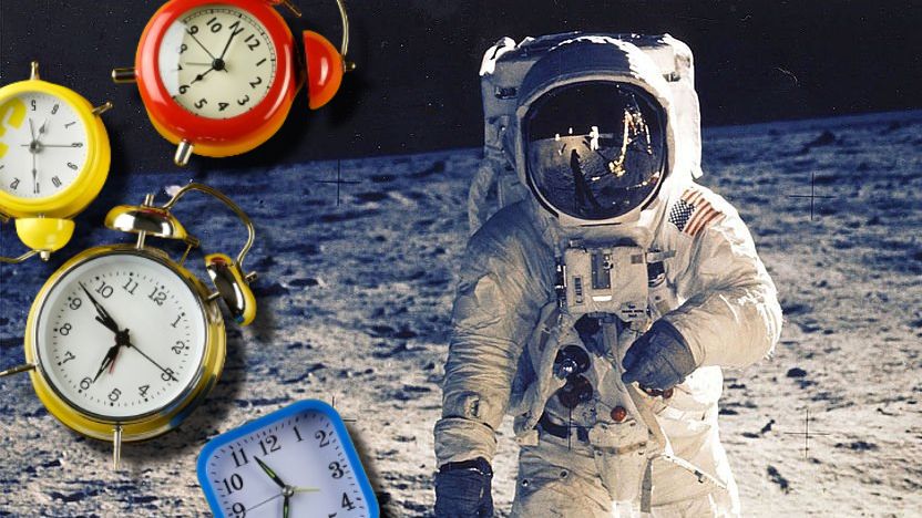 astronaut and alarm clocks
