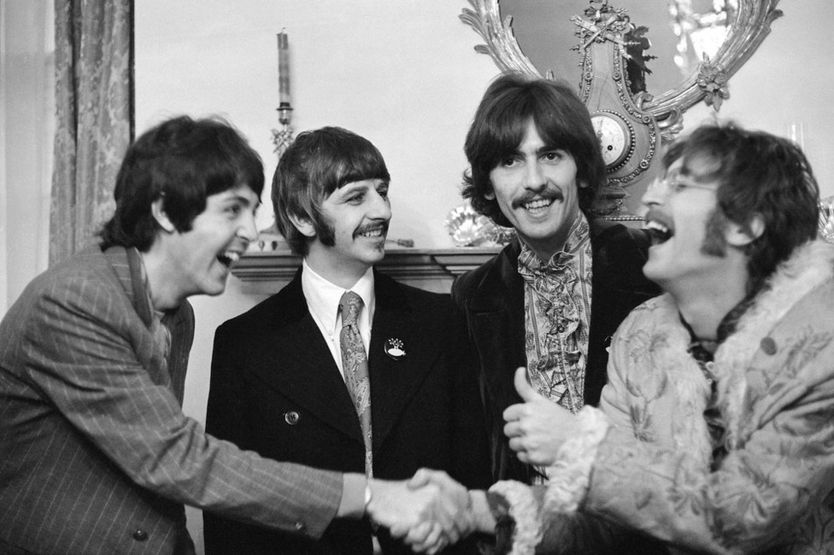 The Beatles at Brian Epstein's home in Belgravia at the launch of Sgt Pepper's
