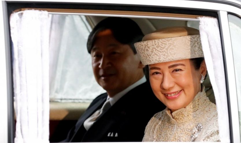 Japan's Crown Prince Naruhito and Crown Princess Masako arrive at the Imperial Palace for the abdication ceremony on 30 April