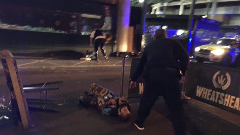 Man on ground at Borough Market