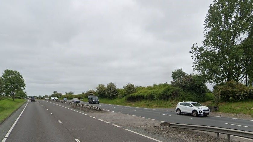 Cars travelling in both directions along a dual carriageway