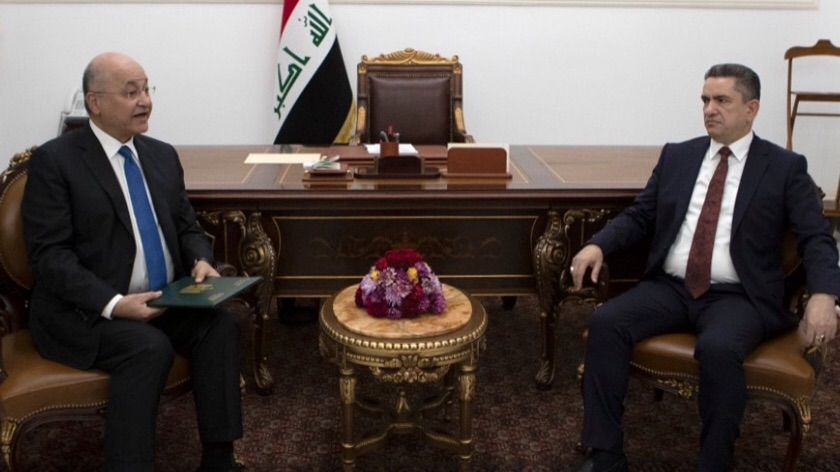 Iraqi President Barham Saleh (left) tasked Adnan al-Zurfi (right) with forming a new government
