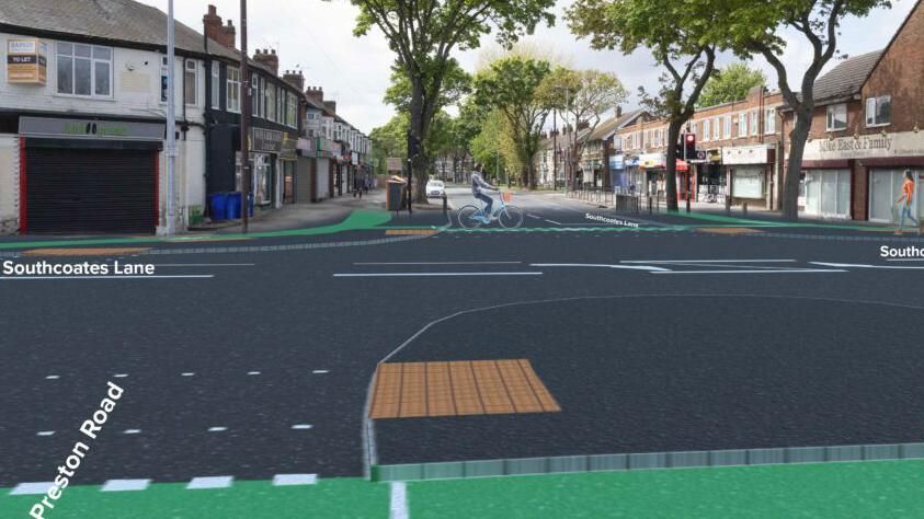 Artist impression of person cycling on a green cycle path on pavement