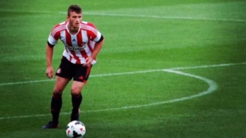 A young Ross Colquhoun playing football wearing Sunderland AFC strip