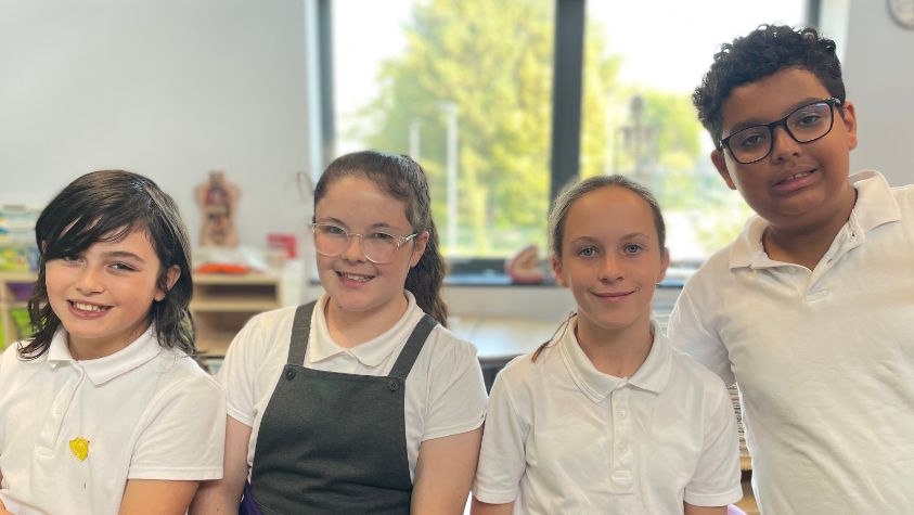 Isabella, Ruby, Branwen and Caleb, pupils at Ysgol Glan Morfa in Cardiff