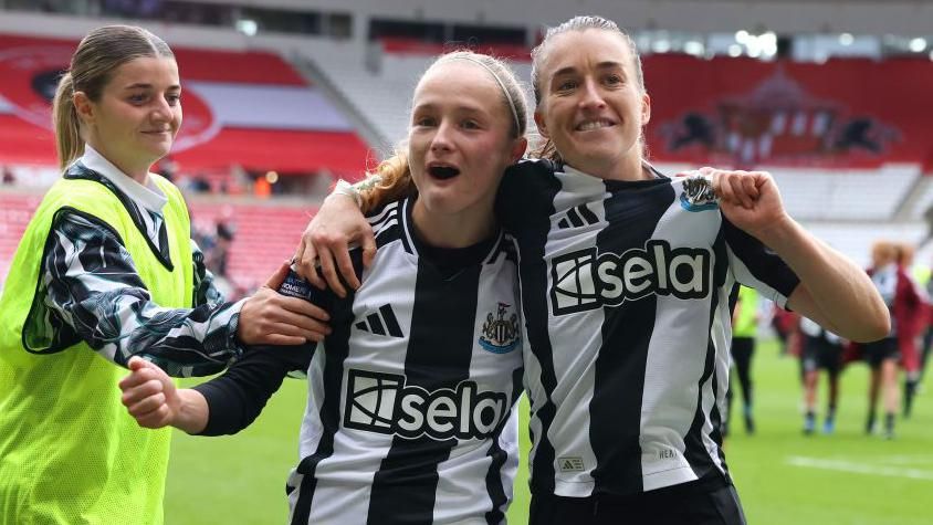 Katie Barker and Amber-Keegan Stobbs of Newcastle celebrate