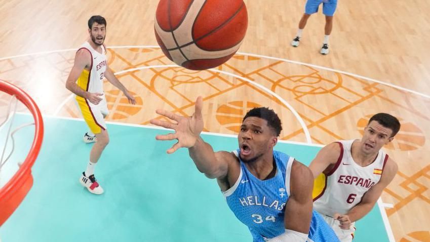 Giannis Antetokounmpo pushes the ball towards the basket for Greece against Spain at the Paris 2024 Olympics