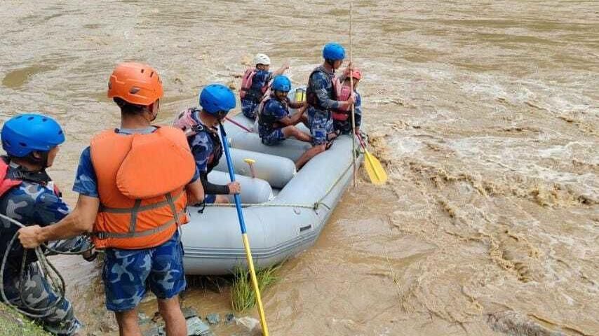 Search and rescue efforts continue after a landslide hit two passenger buses in Chitwan, Nepal on July 11, 2024. At least 65 people are missing after a landslide hit two passenger buses. The incident happened in the Chitwan district, some 86 kilometers (53 miles) west of the capital Kathmandu, when the landslide swept the buses into Trishuli River.