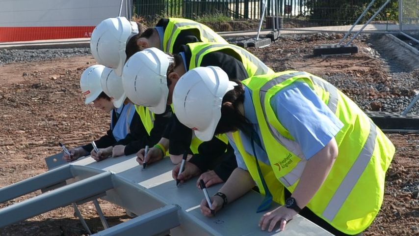 Schoolchildren signed steel frame