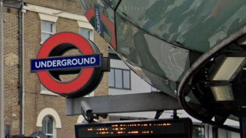 Outside Southwark Underground station, showing the red underground sign