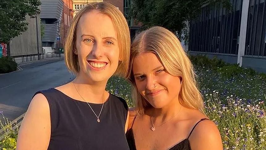 Sisters Laura and Gracie Nuttall both wearing black dresses