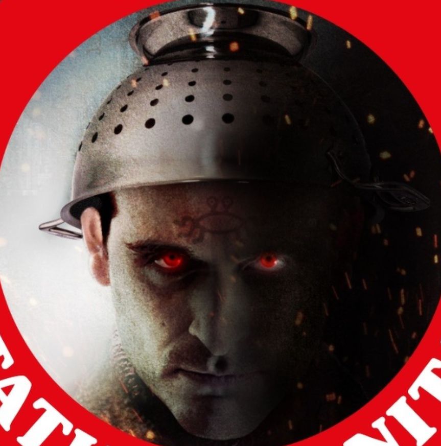 Gilles' Facebook profile picture shows him wearing a metal colander as a hat.